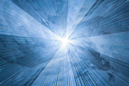 abstract blue background with diverging light rays