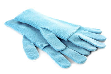 Stylish blue gloves on white background. Autumn clothes