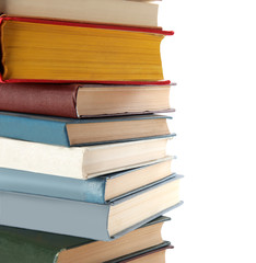 Stack of hardcover books on white background