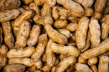 a background of in shell peanuts