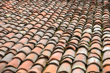 texture of old orange dirty tile roof close up