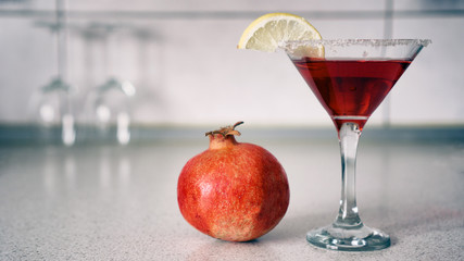 Close up of glass with margarita pomegranate cocktail