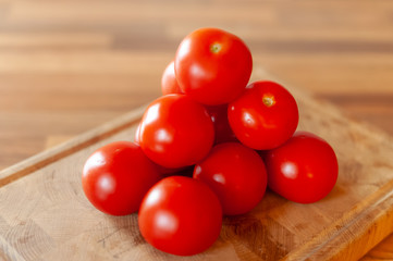 tomatoes on wooden table