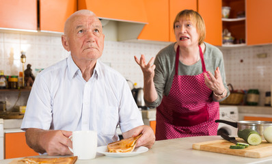 Senior woman scolding her husband