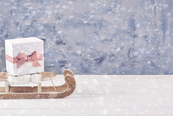 Christmas decoration , gift box on sled. 