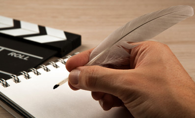 fountain pen in the hands of a screenwriter