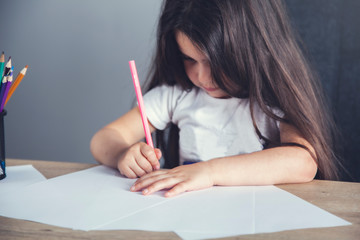 little girl paint on paper