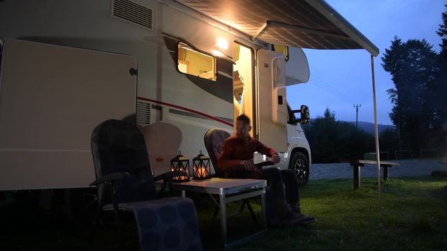 Campground RV and Tent Camping. Evening Relaxing on the Campsite.