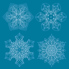 Snowflakes. Set of graphic, vector snowflakes on a blue background.