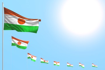 cute many Niger flags placed diagonal with soft focus and free space for content - any celebration flag 3d illustration..