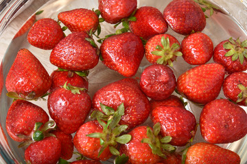 Strawberries in a bowl of water