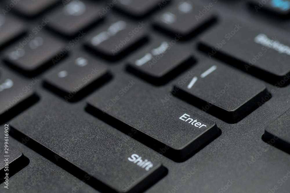 Fototapete enter button on a computer keyboard