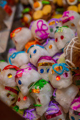 Obraz premium Sugar skulls made of sugar, are typical sweets during the time of October and November for the day of the dead in Mexico