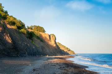 Clay cliff over the sea cost