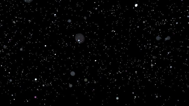 flying sequins on black. slow motion