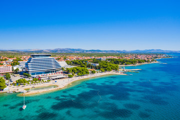Town of Vodice and amazing turquoise coastline on Adriatic coast, aerial view, Croatia