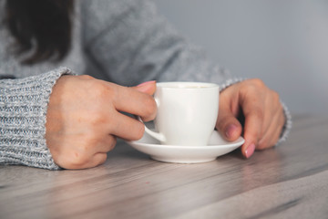 woman hand  cup of coffee