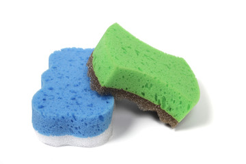 green and blue sponges isolated on white background