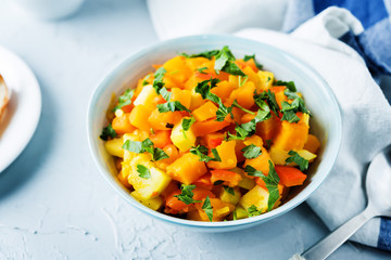 Pumpkin potato carrot stew in the bowl