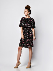 Close up portrait of a beautiful girl in a dark romantic dress. Tender tenderness model looking at camera