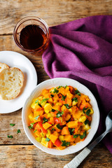 Pumpkin potato carrot stew in the bowl