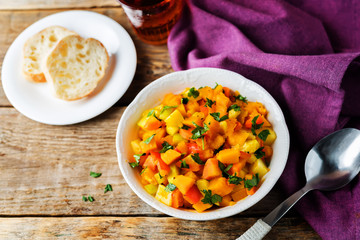 Pumpkin potato carrot stew in the bowl