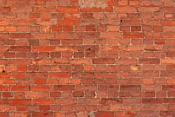  brick wall of dark red color
