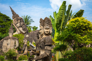Buddha park Xieng Khouane in Vientiane, Laos. Famous travel tourist landmark of Buddhist stone statues and religious figures.