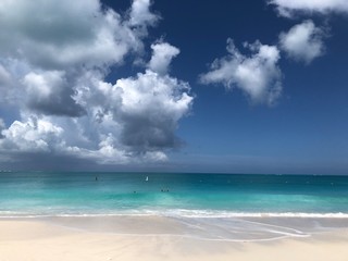 thunderhead clouds over the blue ocean
