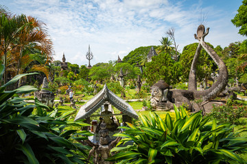 Buddha park Xieng Khouane in Vientiane, Laos. Famous travel tourist landmark of Buddhist stone statues and religious figures.
