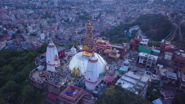 Aerial: Swayambhu temple is an ancient religious architecture atop a hill in the Kathmandu Valley, west of Kathmandu city