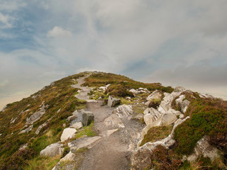 Fototapeta na wymiar Path on top of Diamond hill, Connemara National park, county Galway Ireland. Cloudy sky, Nobody.