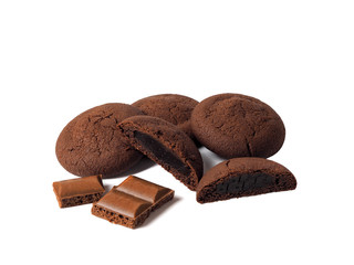 Chocolate cookies and pieces of chocolate on a white background