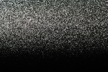Black abstract glittered background. Festive backgrounds.