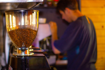 machines for grinding coffee beans and barista