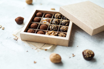 Chocolate truffle balls with cocoa powder in box