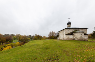 Fototapeta premium Church of Kosma and Domian with Gremyachaya hill, 12th century. Pskov, Russia