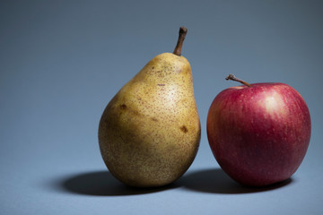 Ripe fruits on a gray background shot closeup.
