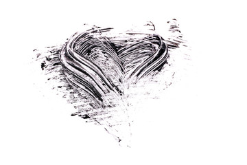 Mascara stroke in shape of heart on white background