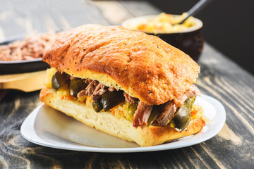 sandwich with pulled pork and sauerkraut