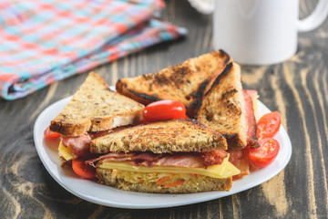 Reuben sandwich on a white plate