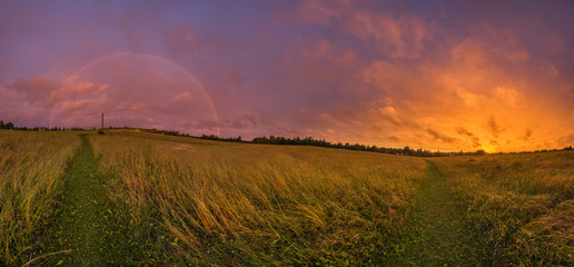 Fototapeta na wymiar sunset and rainbow