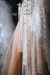 Sleeve of a wedding dress in champagne colour
