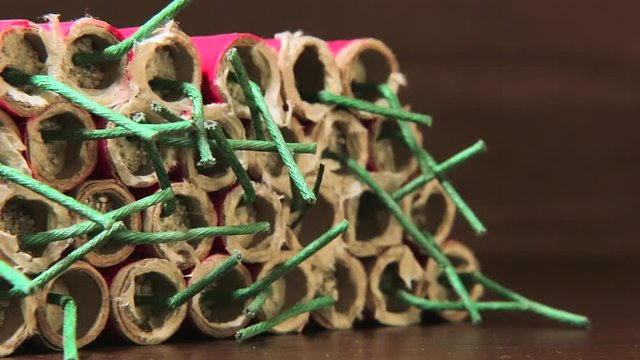 Big firecrackers on a wooden surface slider shoot
