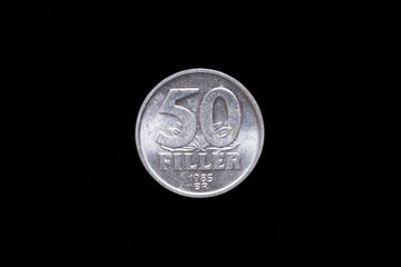 Old Hungarian 50 Filler coin from 1985, reverse. Isolated on black background