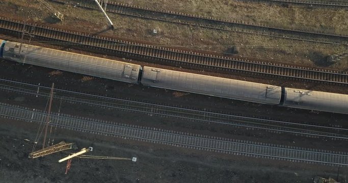 Railway with a passing train. 4K video, 240fps, 2160p.