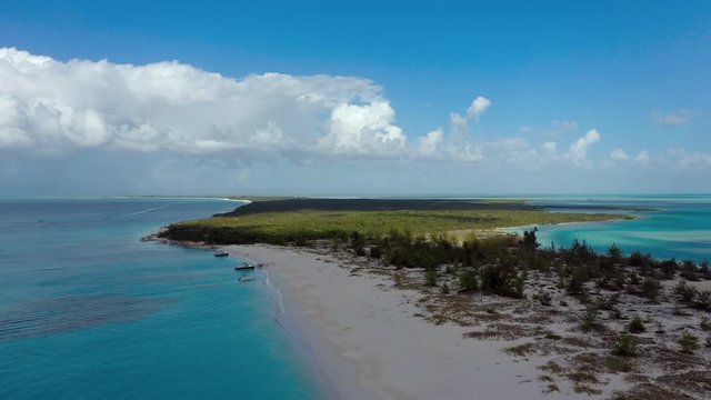 Aerial: Wide View of Secluded Tropical Island With Green Foliage, Marshland and Shrubbery - Providenciales, Turks and Caicos