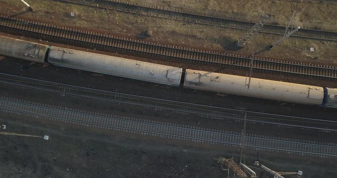 Long train passing by rail. 4K video, 240fps, 2160p.