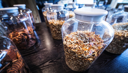 Glassware with canned food and cooking ingredients.