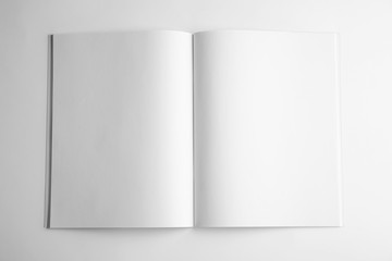 Blank open book on white background, top view. Mock up for design